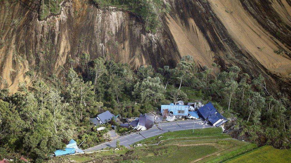 Houses destroyed by a large mudslide