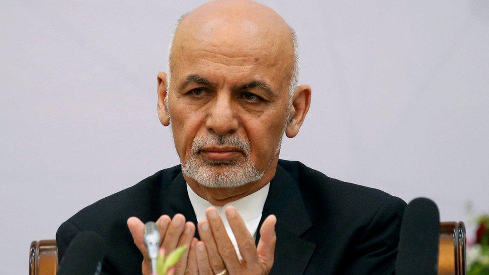 Afghan President Ashraf Ghani prays during a peace and security cooperation conference in Kabul, Afghanistan 6 June 2017