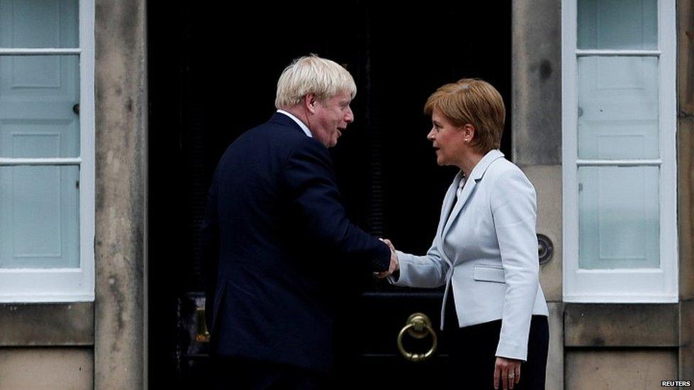 Nicola Sturgeon greets Boris Johnson outside her official residence in Edinburgh in July 2019