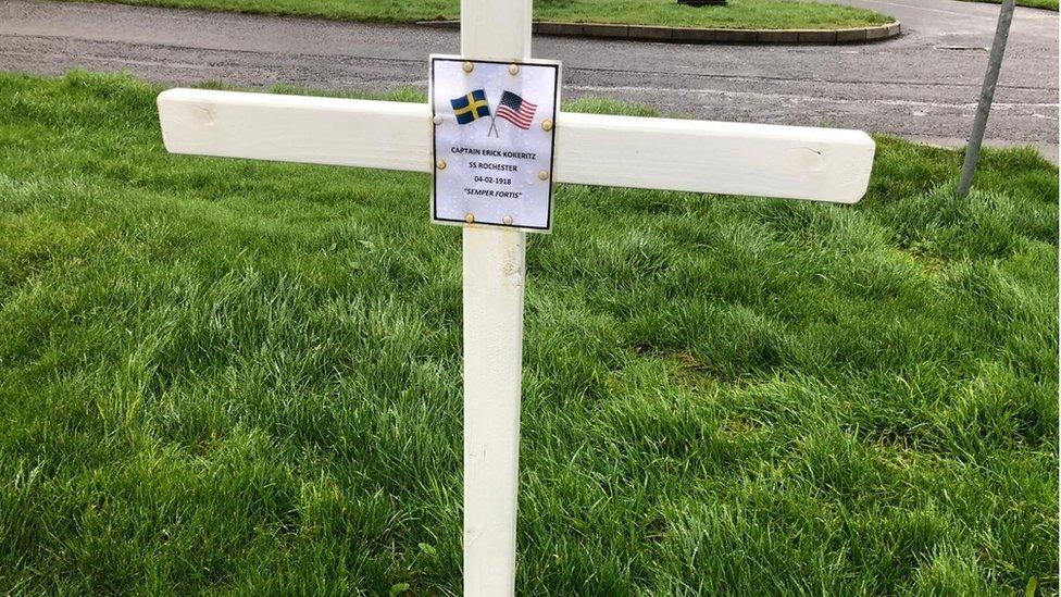 plaque on the cross where Captain Kokeritz is buried