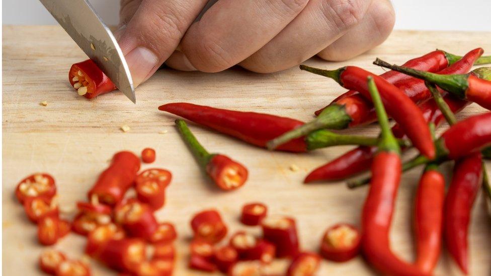 chopping chillies