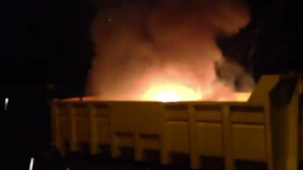 The grenades being destroyed in a controlled explosion