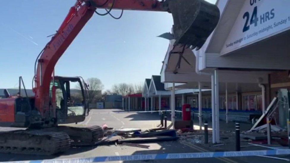 Digger rammed into Tesco