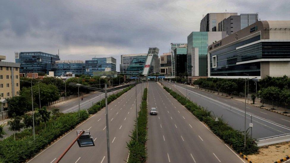 Vehicles move through DLF Cybercity during nation wide lockdown amid Covid-19 coronavirus pandemic in Gurugram