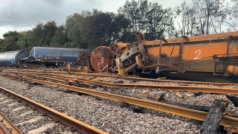 Train wagons derailed from the track.