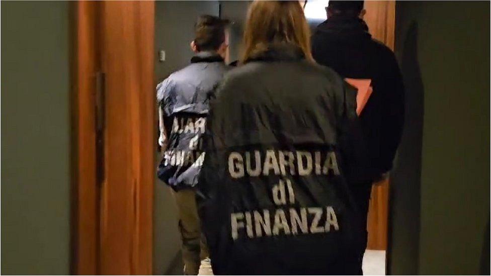 Italian financial police carrying out a raid