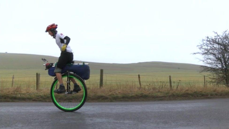 Ed Pratt on a unicycle