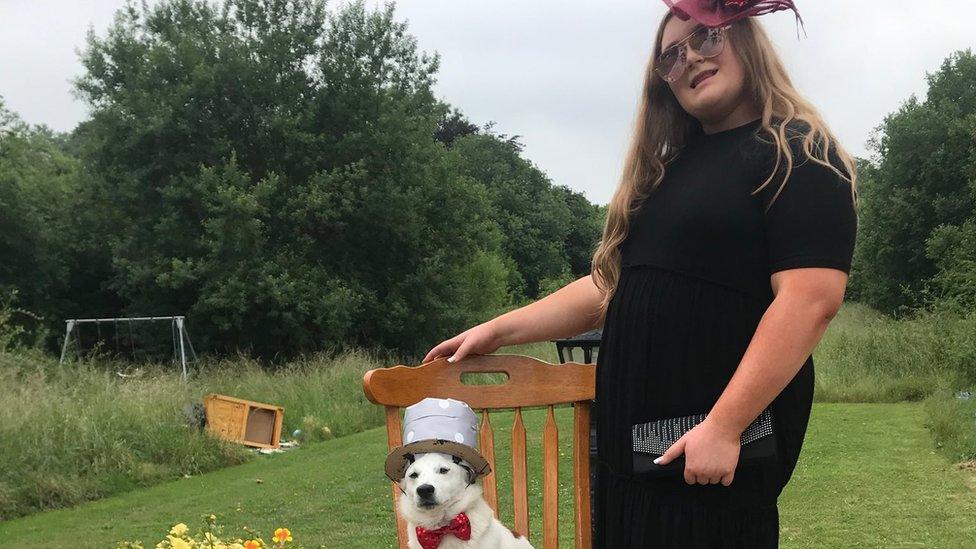 Aoife Byrne and dog Louie, sat on a chair