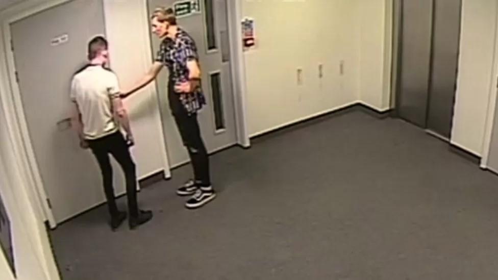 Aaron Ray (white t-shirt) and Jason Brockbanks in his student flat