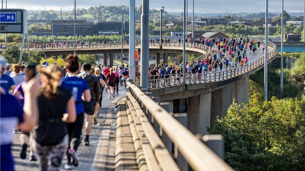 Runners crossing the Kingston Bridge in Glasgow during the Great Scottish Run