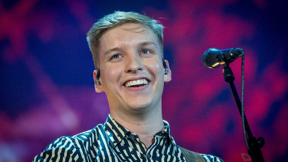 George Ezra by a microphone