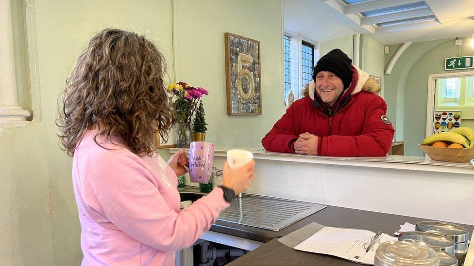 Man and woman in tea room