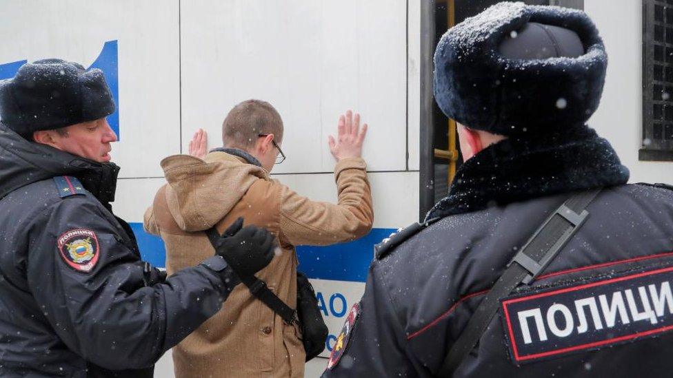 Russian policemen detain a supporter of the former first Minister of Defence of the Donetsk People Republic DPR Igor Strelkov (Girkin) after the verdict announcement in Strelkov trial near the Moscow City Court in Moscow, Russia, 25 January 2024