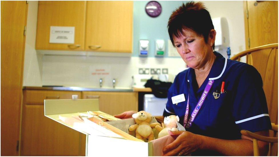 Sue Armstrong with a baby box