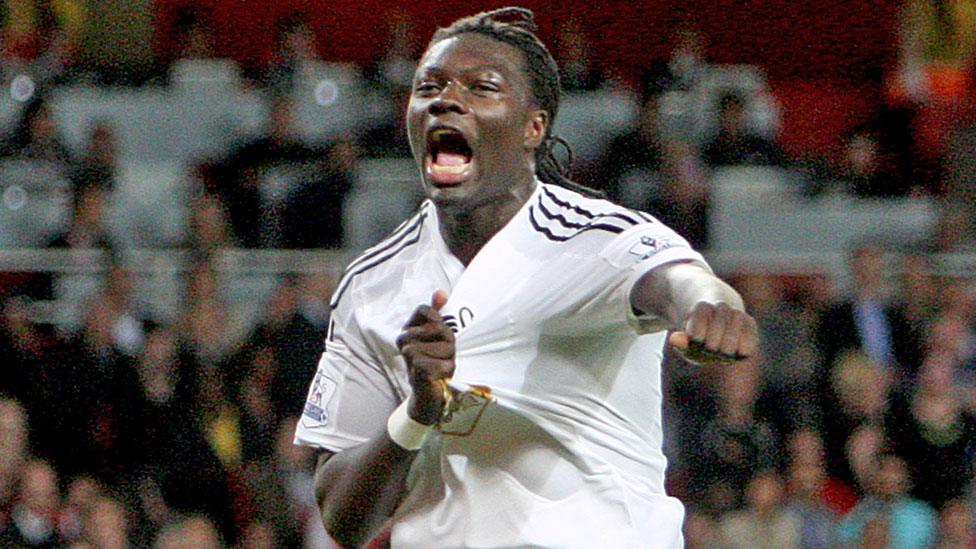 Bafetimbi Gomis celebrates scoring for Swansea against Arsenal