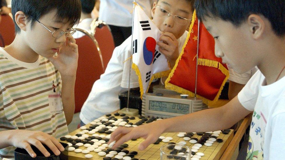 Chinese students playing the game Go