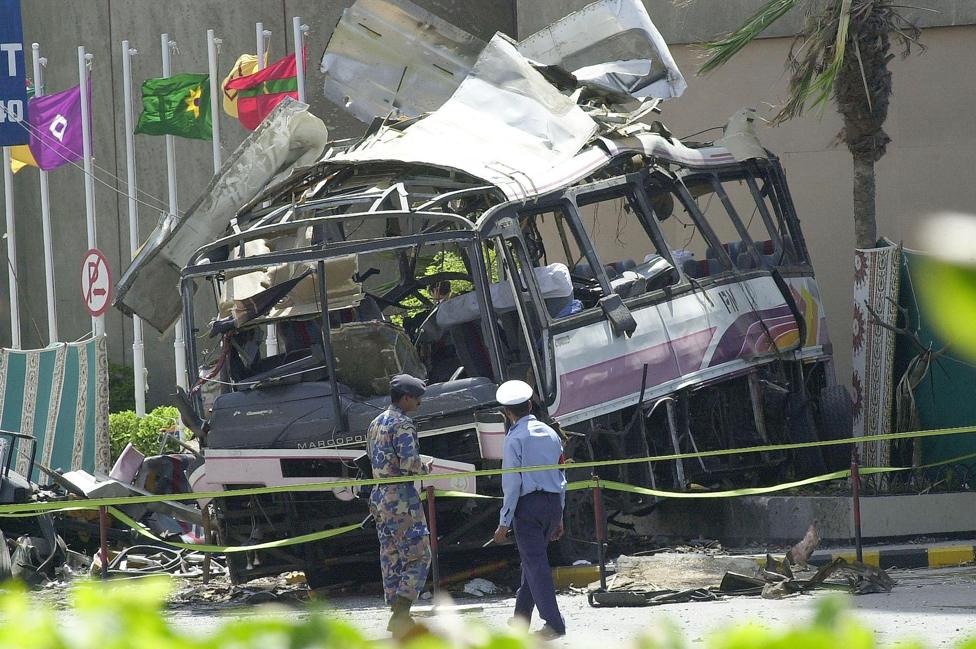 Wrecked bus in Karachi, May 2002