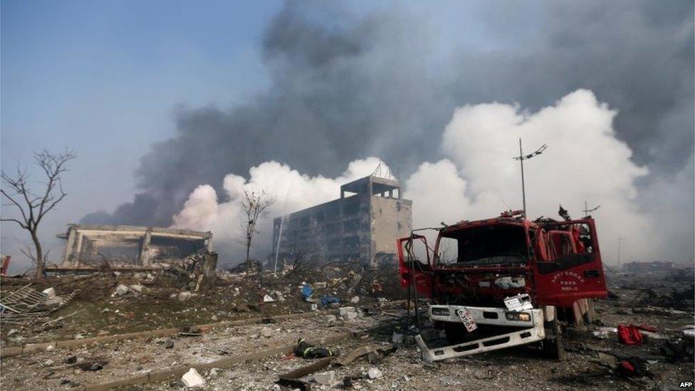 A damaged fire truck is seen at the site of the massive explosions in Tianjin on August 13, 2015.