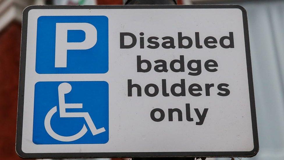 A sign for blue badge holders only