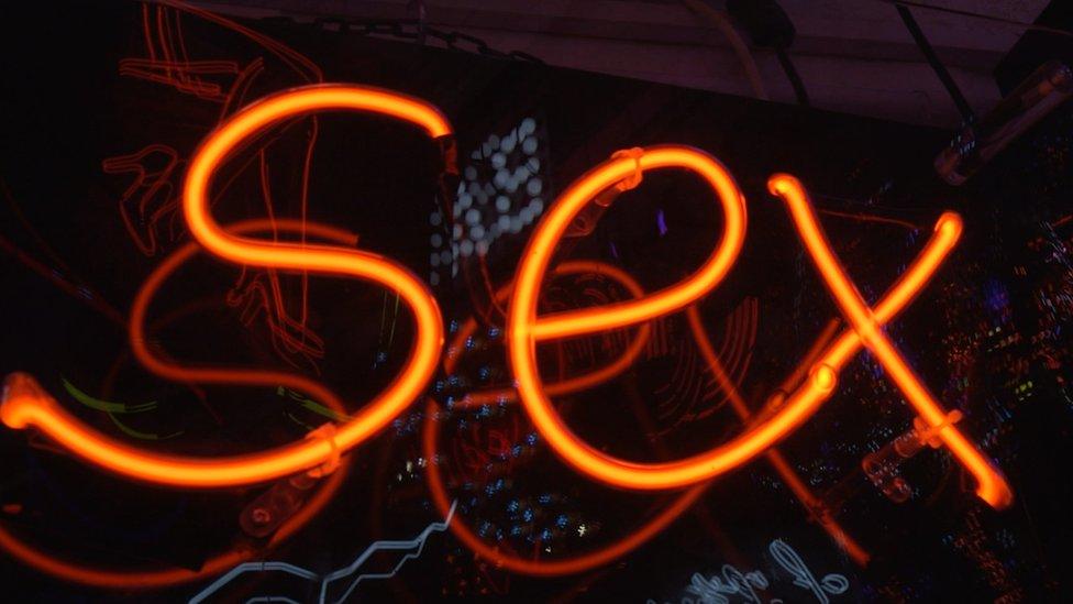 neon sign saying 'sex'