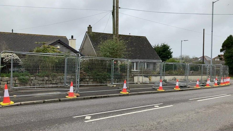 Part of garden collapsed into mineshaft and safety fencing