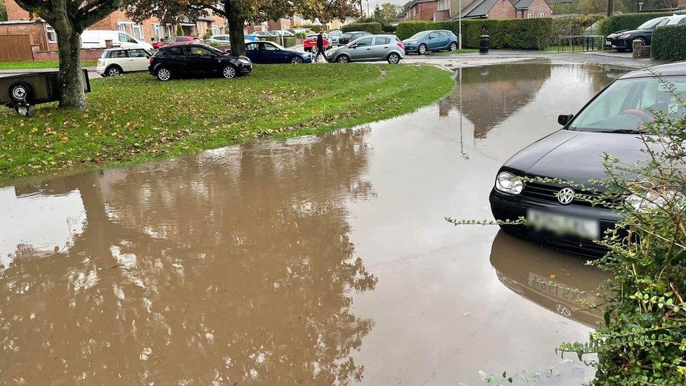 Flooding shown in McCreery Road in Sherborne, Dorset