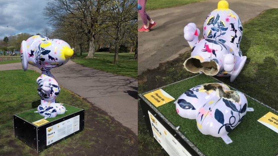 Snoopy sculpture before it was destroyed and after being snapped off