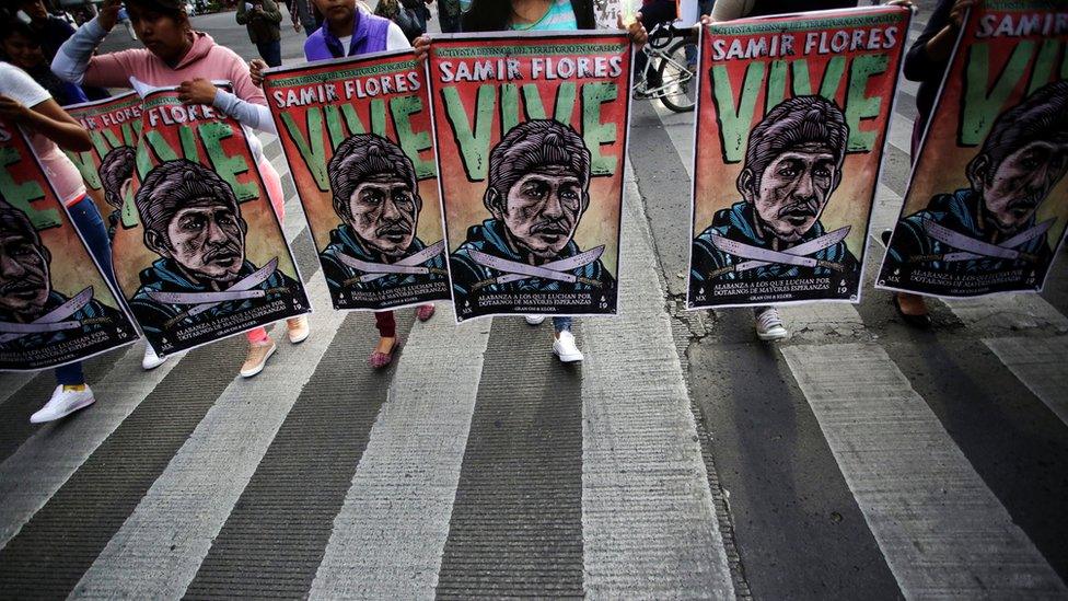 Demonstrators take part in a protest to demand justice for Mexican activist Samir Flores Soberanes