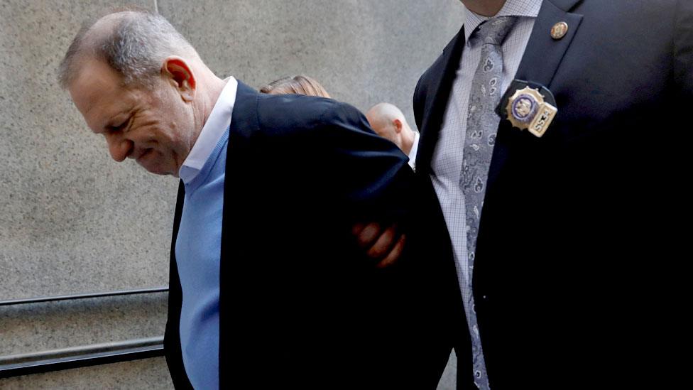 Weinstein in handcuffs