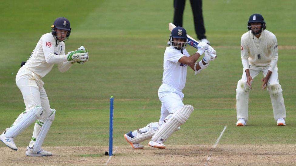 India batsman Ajinkya Rahane hits out watched by Jos Buttler during day four of the Second Test Match between England and India at Lord's Cricket Ground on August 15, 2021 in London, England.