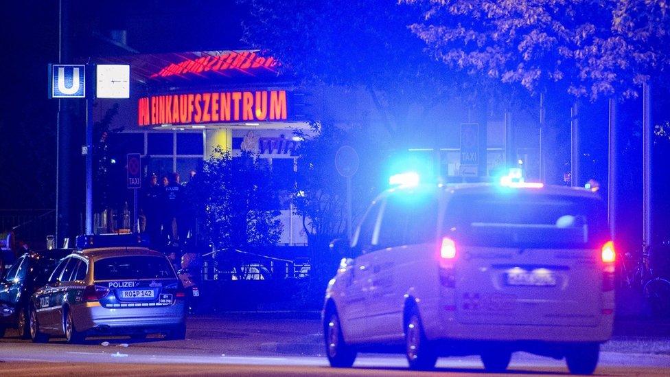 Police outside the shopping centre in Munich. 23 July 2016