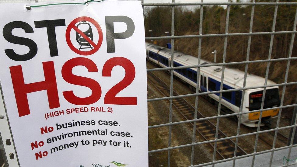 Stop HS2 sign on a railway bridge