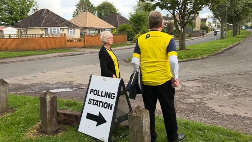 Staff outside Kidlington polling station