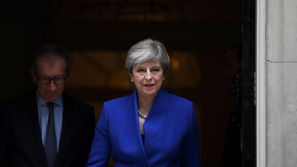 Theresa May leaves 10 Downing Street in central London on June 9, 2017, en route to Buckingham Palace to meet Queen Elizabeth II