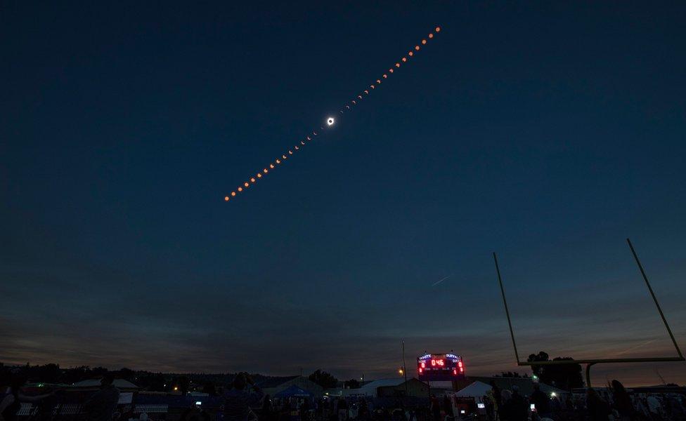 A handout photo made available by Nasa shows a composite image showing the progression of a total solar eclipse over Madras, Oregon, USA, 21 August 2017.