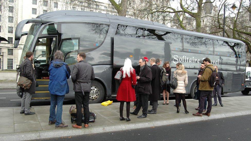 Passengers on coach tour of central London