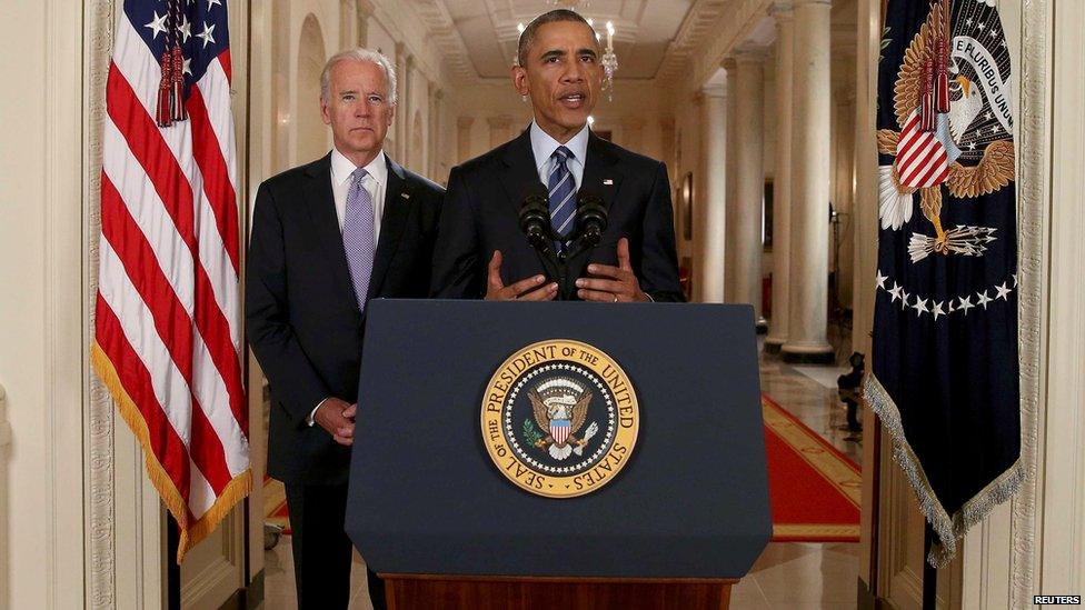 US President Barack Obama delivers a statement about the nuclear deal reached between Iran and six major world powers with Vice President Joe Biden at his side during an early morning address to the nation from the East Room of the White House in 14 July 2015