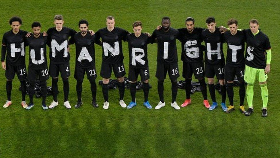 Germany support migrant workers' rights in a World Cup qualifier in March