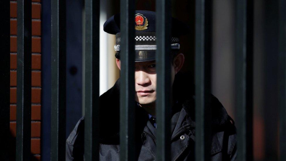 A security guard at the Beijing kindergarten