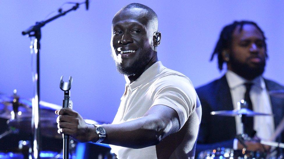 Stormzy performing on stage