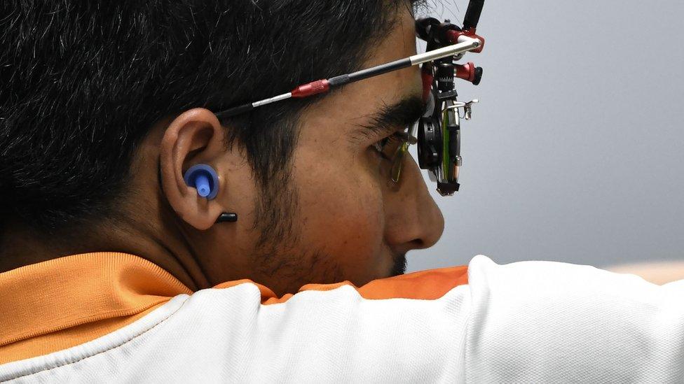 Saurabh Chaudhary competes in the men's 10m air pistol shooting final during the 2018 Asian Games in Palembang on August 21, 2018.