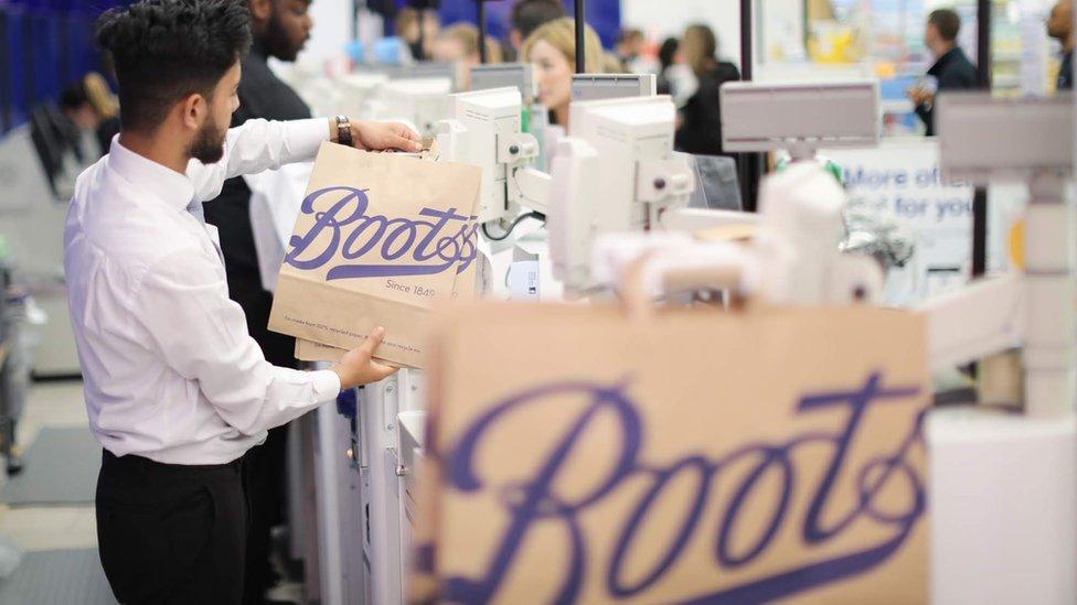 Boots paper bags in a shop