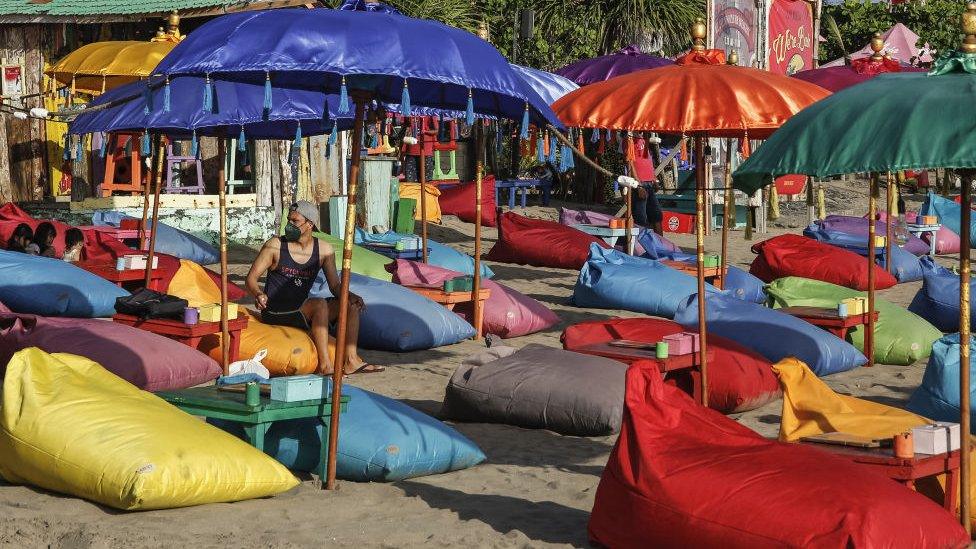 Visitors enjoy the beach during the government relaxed Covid-19 restrictions