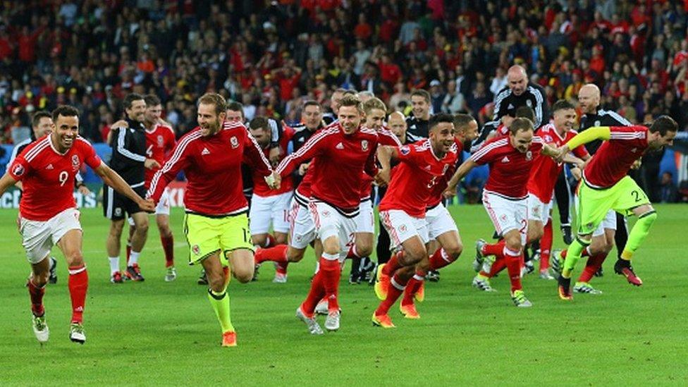 Wales players celebrate after beating Belgium