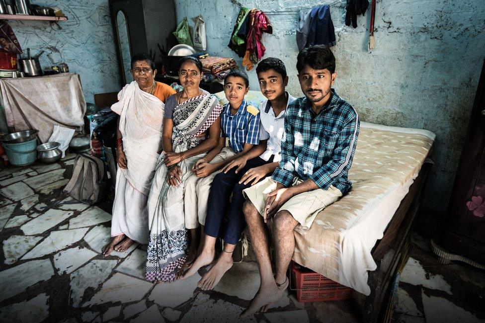 Y Laxmi (second, left) says a $180 annual handout helps her educate her two sons (third and fourth, left) TREATED PICTURE