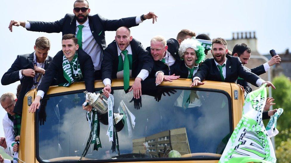 Hibs players taking part in victory parade