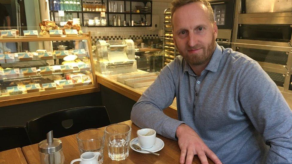 Antonin Kokes smiles in a bakery in Prague