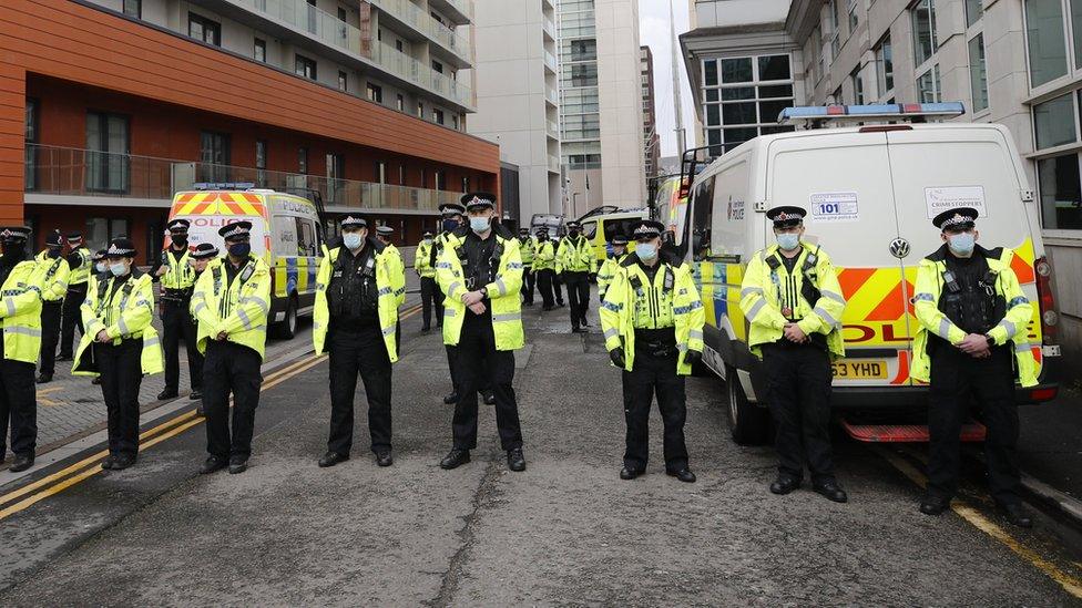 Police officers at the Lowry Hotel