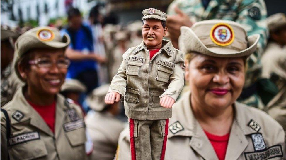 Venezuelan militias demonstrate their support to the government of Venezuelan President Nicolas Maduro and against US President Donald Trump, in Caracas, on August 14, 2017.