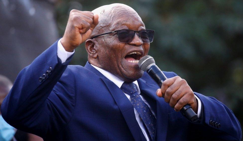 South Africa's former President Jacob Zuma sings to supporters after appearing at the High Court in Pietermaritzburg, South Africa, May 17, 2021.